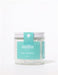Asilia Salt Pearls in a clear jar with a teal label, ideal for enhancing dishes or health benefits.