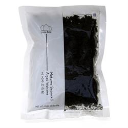 Dried wakame seaweed in clear packaging, 50g, by Emma Basic, ideal for health food enthusiasts.