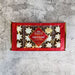 Lambertz Zimsterne Christmas cookies in star shape with white icing, packaged in a red box.