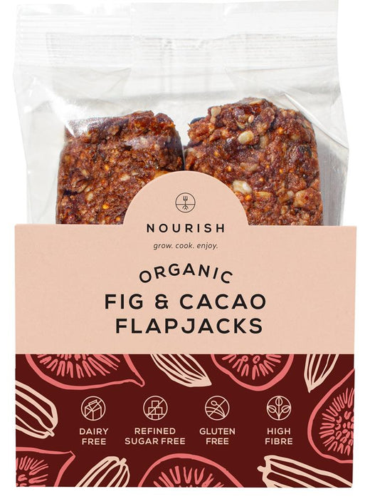 Organic fig and cacao flapjacks in a clear bag, gluten-free, dairy-free, and high in fiber, by Nourish Grow Cook Enjoy.
