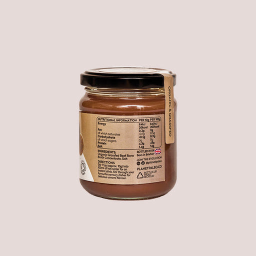 Organic bone broth concentrate in a glass jar, 250g, grass-fed beef by Planet Paleo.