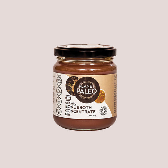 Organic beef bone broth concentrate in a glass jar by Planet Paleo, 250g, featuring a minimalist label design.